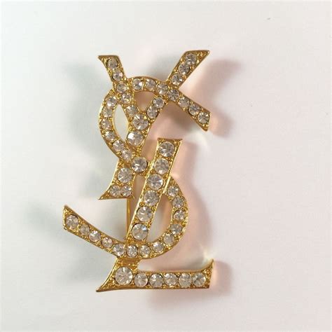 saint laurent jewelry pins.